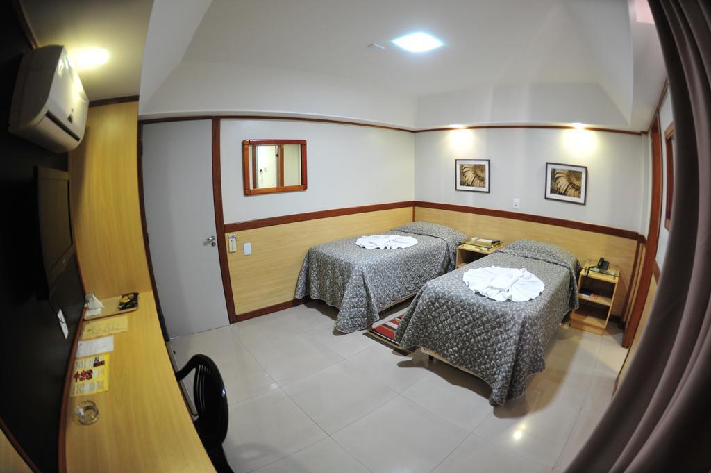 Hotel Premium Plaza Muriae Bagian luar foto